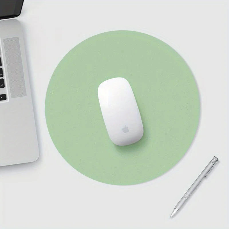 tapis de souris rond vert.